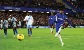  ?? Photograph: Matthew Childs/Action Images/Reuters ?? Chelsea’s Noni Madueke showed composure to score the winner from the penalty spot.