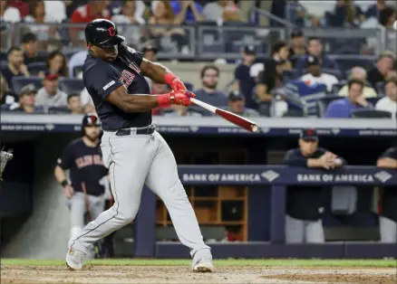  ?? FRANK FRANKLIN II — THE ASSOCIATED PRESS ?? Yasiel Puig hits a home run during the seventh inning against the Yankees on Aug. 16 in New York.