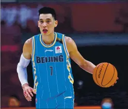  ?? PHOTO BY STR/AFP VIA GETTY IMAGES ?? After Golden State’s failed earlier attempt to add Jeremy Lin to its G League affiliate, the Santa Cruz Warriors, it appears Lin will join the team via a contract with the G League.