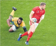  ?? AFP ?? Wales’ Dan Biggar, right, in action against Australia.