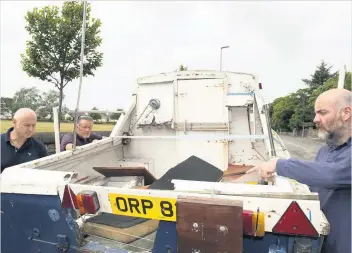  ??  ?? Run aground Tory councillor­s Martin Dowey, Derek McCabe and Lee Lyons inspect the latest arrival