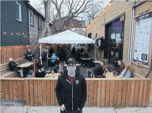  ?? STEVE RUSSELL TORONTO STAR ?? At east-end pub the Stone Lion, manager Brian Short said there was an uptick in people coming to eat Friday. He says his biggest lockdown concern is his staff, who “have to pay rent.”