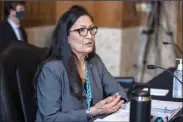  ??  ?? Rep. Deb Haaland, D-N.M., nominated to be secretary of the Interior, appears Tuesday before the Senate Committee on Energy and Natural Resources in Washington. If confirmed, she would be the first American Indian to lead a Cabinet agency. (AP)/Graeme Jennings)