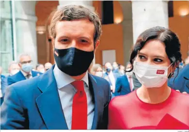  ?? ZIPI / EFE ?? El líder del PP, Pablo Casado, junto a la presidenta de la Comunidad de Madrid, Isabel Díaz Ayuso.