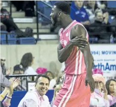  ?? BOB TYMCZYSZYN/ POSTMEDIA NEWS ?? Niagara River Lions founder and chief executive officer Richard Petko, taking in the action from his court- side seat, is the founder of the Canadian Elite Basketball League, a spring/ summer league that will have a franchise in Niagara when the...