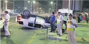  ??  ?? One of the vehicles involved in the accident that happened at the intersecti­on of the Sheikh Zayed Road on Friday. Following the incident, the Abu Dhabi Police urged motorists to abide by rules.