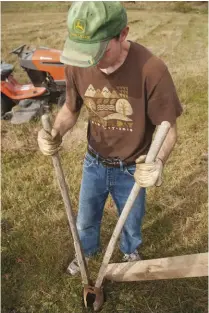  ??  ?? for a singlepost repair, a clamshell digger (right) is the best tool to create a hole for the new pasture post.