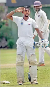  ??  ?? Promod Maduwantha of Saracens celebrates his double ton in style - Pic by Priyantha Wickramaar­achchi