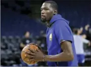  ?? MARCIO JOSE SANCHEZ - THE ASSOCIATED PRESS ?? Golden State Warriors’ Kevin Durant prepares to shoot during a practice Wednesday in Oakland, Calif. The Golden State Warriors face the Cleveland Cavaliers in Game 1 of the NBA Finals on Thursday in Oakland.