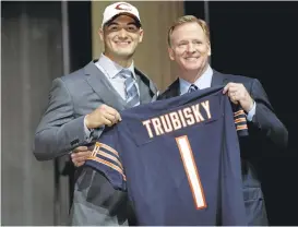  ?? MATT ROURKE/ASSOCIATED PRESS ?? New Bears QB Mitch Trubisky, left, poses with NFL commission­er Roger Goodell.