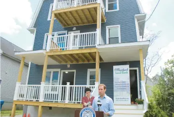  ?? TED GLANZER/HARTFORD COURANT ?? The 100-year-old property at 103 Earle St. will soon welcome tenants after undergoing an extensive renovation by the Hartford Land Bank in partnershi­p with private developer Menard “Tex” Sampson and the city.