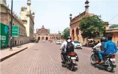  ?? ANI ?? A deserted view of a brick road leading to the historical Rumi Darwaza amid a surge in Covid-19 cases in Lucknow on Friday.