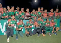  ?? AP ?? Bangladesh players pose with the trophy after defeating the West Indies in the third T20 internatio­nal match. —