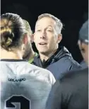  ?? COURTESY OF UCF ATHLETICS ?? UCF soccer coach Scott Calabrese, center, is figuring out whether he can recruit as many internatio­nal players amid the coronaviru­s pandemic.