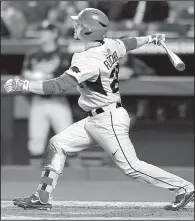  ?? NWA Democrat-Gazette/ANDY SHUPE ?? Arkansas center fielder Dominic Fletcher’s only hit Friday was a big one — a two-run home run in the seventh inning that tied Vanderbilt at 3-3. The Razorbacks went on to win 4-3 on Luke Bonfield’s game-winning RBI single in the bottom of the ninth.