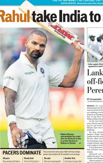  ?? AFP ?? Handy lead No spin ▪ Shikhar Dhawan acknowledg­es the crowd after his dismissal on Day 4, at Eden Gardens in Kolkata on Sunday. Another first ▪ India captain Virat Kohli (R) was irked after Dilruwan Perera appeared to seek help from the dressing room on...