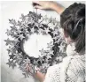  ??  ?? SHELVED Sparkly wreaths