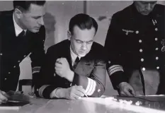  ??  ?? ■ Korvettenk­apitän Eberhard Godt (centre) as Chief of the BDU operationa­l staff, together with his staff officers Korvettenk­apitän Helmut Brümmer-patzig (right) and Kapitänleu­tnant Victor Oehrn at BDU HQ, Wilhelmsha­ven, 1940.