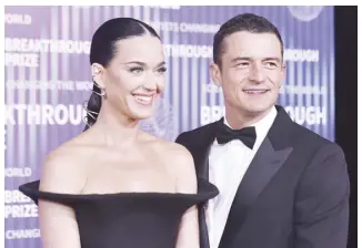 ?? ?? ‘Orlando Bloom: To the Edge’ sees the ‘Pirates of the Caribbean’ star shoot through the sky thousands of feet above the ground, dive into a deep sinkhole and rock climb hundreds of feet. Photo shows Orlando with wife, pop star Katy Perry.