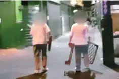  ?? BBC ?? Courage: Bakers with bread baskets and a broom track the attackers. (Right) cyclist points out the terrorists to police