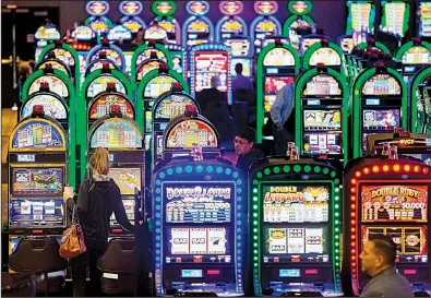  ?? NWA Democrat-Gazette/JASON IVESTER ?? Gamblers check out the casino floor during opening day at the Cherokee Casino in Grove, Okla., in January 2017. Tribal casino revenue in Oklahoma in 2016 was $4.4 billion, according to an industry report.