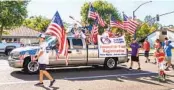 ?? SPIRIT OF THE FOURTH ?? The Rancho Bernardo Historical Society entered its horse-drawn mud wagon in the 2019 Spirit of the Fourth Parade. At right, the Rancho Bernardo Little League was among youth groups that participat­ed in 2019.