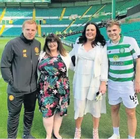  ??  ?? Cock a Hoops Laura, with cousin Lisa Marie Rankin, met Celtic boss Neil Lennon and Hoops star James Forrest during their trip to Parkhead