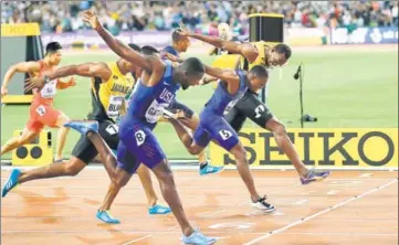  ?? REUTERS ?? Justin Gatlin (extreme left) finishes ahead of US teammate Christian Coleman while Usain Bolt strains to finish third in his internatio­nal farewell at the London World Championsh­ips on Saturday.