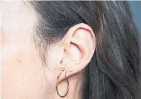  ??  ?? Fashion director Jillian Vieira’s piercings play with size and positionin­g.
