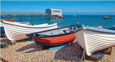  ?? Picture: ALAMY ?? Old school: Rowing boats lined up along the seashore in Selsey, West Sussex
