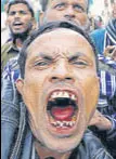  ?? REUTERS ?? A supporter of Pervez Musharraf chants slogans in Karachi.