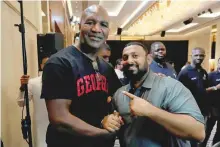  ?? Reuters ?? Former boxers Evander Holyfield (left) and Prince Naseem Hamed pose at the Radisson Blu Hotel Al Salam, Jeddah on Thursday.