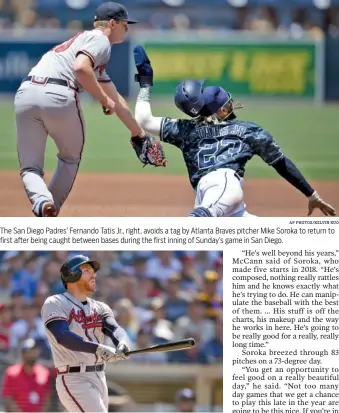  ?? AP PHOTOS/KELVIN KUO ?? The San Diego Padres’ Fernando Tatis Jr., right, avoids a tag by Atlanta Braves pitcher Mike Soroka to return to first after being caught between bases during the first inning of Sunday’s game in San Diego. Atlanta Braves first baseman Freddie Freeman tracks the flight of the ball after hitting a three-run home run during the eighth inning of a 4-1 win against the host San Diego Padres on Sunday.