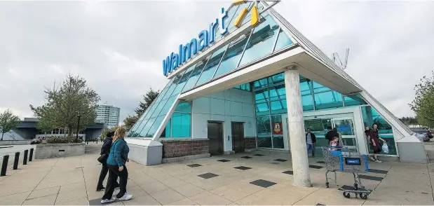  ??  ?? The Walmart at Guildford Town Centre in Surrey reopened Saturday, a day after it was closed due to a legionnair­es’ disease scare. The mall is taking “proactive measures” to clean cooling towers that tested positive for legionella bacteria, says Fraser Health’s Dr. Aamir Bharmal. Francis Georgian/