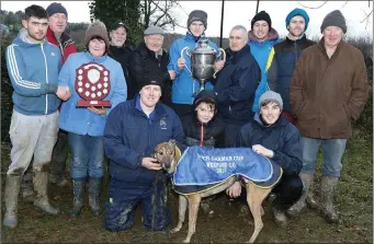  ??  ?? The Doyle family and friends at the presentati­on of The Loch Garman Cup won by ‘Tractorman’.