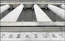  ?? Olivier Douliery / Getty Images ?? An exterior view of the building of U.S. Department of the Treasury in Washington, D.C. on March 27, 2020.