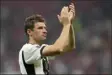  ?? MARTIN MEISSNER -THE ASSOCIATED PRESS ?? Germany’s Thomas Mueller applauds fans after a World Cup Group E match against Costa Rica at the Al Bayt Stadium in Al Khor, Qatar, on Thursday.