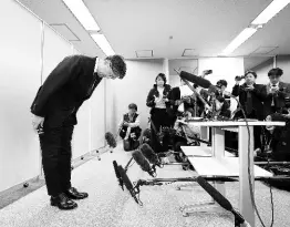  ?? AP ?? Toyota Motor Corp. CEO Koji Sato bows in front of the media in Tokyo, Japan, on Monday. Toyota Chief Sato apologised on Monday to customers, suppliers and dealers for flawed testing at a group company, which follows similar problems in recent years.