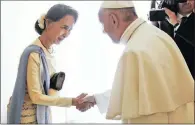  ?? PICTURE: AP ?? Myanmar’s leader Aung San Suu Kyi is welcomed by Pope Francis at the Vatican in May.the pontiff is due to begin a visit to Myanmar and Bangladesh today.