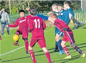  ??  ?? Fairmuir and Arbroath Lads (maroon) drew 1-1 in the U/14 DS Rennie League at Graham Street.