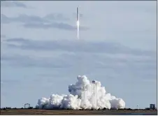  ?? AUBREY GEMIGNANI/NASA VIA AP ?? The Northrop Grumman Antares rocket with Cygnus resupply spacecraft onboard, launches at NASA’s Wallops Flight Facility on Saturday, Feb. 15in Wallops Island, Va. The cargo ship is rocketing toward the Internatio­nal Space Station, carrying the usual experiment­s and gear but also candy and cheese to satisfy the crew’s cravings.