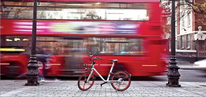  ?? PROVIDED TO CHINA DAILY ?? One of Mobike’s shared bicycles stands in London’s Islington neighborho­od.