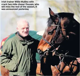  ??  ?? Irish trainer Willie Mullins with crack two-mile chaser Douvan, who will miss the rest of the season, it was announced yesterday