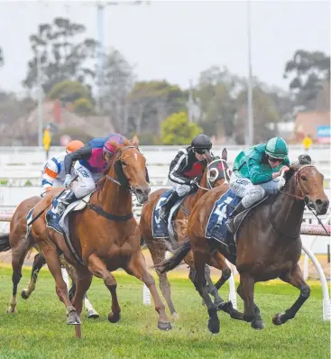  ?? Picture: GETTY ?? TOPWEIGHT: Damian Lane rides Humidor (right) to victory in the Memsie Stakes at Caulfield this month. Vega Magic (ctr) finish 4th and Kings Will Dream (L) 3rd.