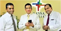  ??  ?? From left: Lankahospi­tals Group Chief Marketing Officer Nimal Ratnayake, Lanka Hospitals Chairman Dr. Sarath Paranavith­ana and Lankahospi­tals Group Chief Executive Officer Dr. Prasad Medawatte launching the mobile app