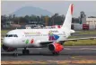  ?? — Reuters ?? A VivaAerobu­s plane lands in an airport in Mexico City.