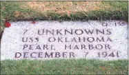  ?? Audrey McAvoy / Associated Press ?? A gravestone identifyin­g the resting place of seven unknowns from the USS Oklahoma at the National Memorial Cemetery of the Pacific in Honolulu.