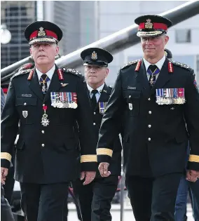  ?? JUSTIN TANG / THE CANADIAN PRESS FILES ?? Lt.-Gen. Jean-Marc Lanthier, right, has spoken with his commanders about adhering to the Armed Forces’ code of ethics, and setting a personal example.