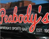  ?? LAUREN HALLIGAN — LHALLIGAN@DIGITALFIR­STMEDIA.COM ?? Peabody’s Sports Bar &amp; Grille in downtown Saratoga Springs is currently for sale.