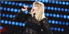  ?? JOHN SALANGSANG/ INVISION/ AP ?? Taylor Swift performs at a 2017 Super Bowl party in Houston.